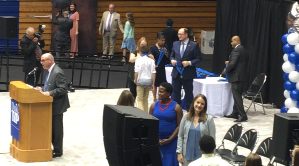 Carter receives his well deserved medal at the Duke TIP Grand Ceremony in 2018